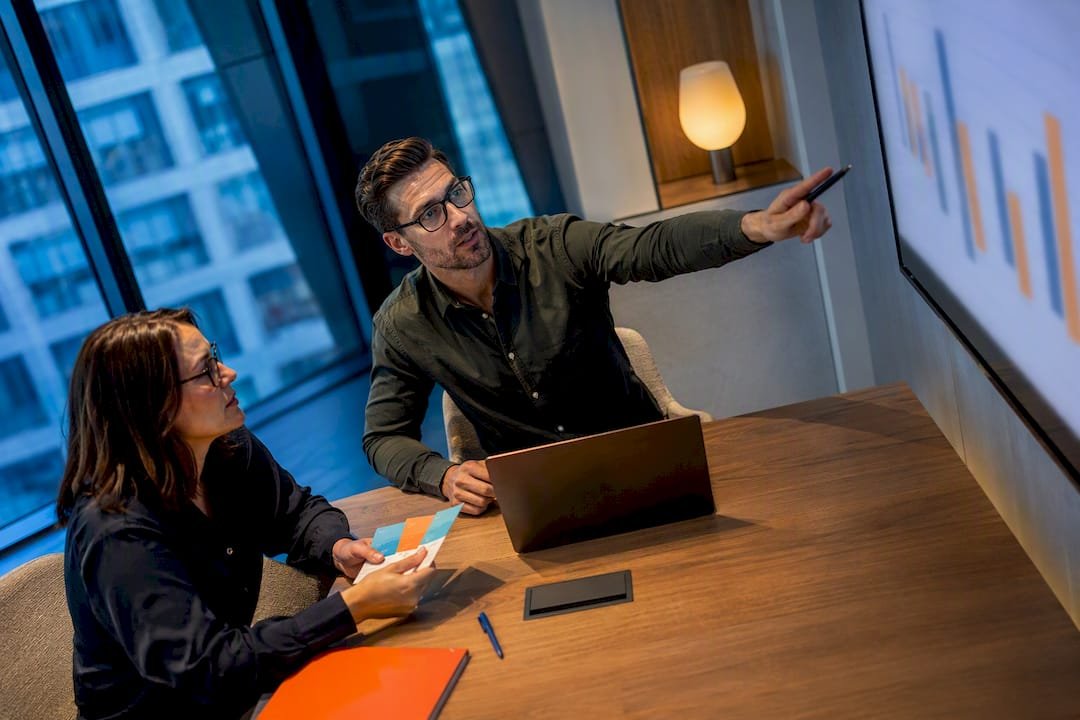 Team reviewing sales pipeline revenue forecast