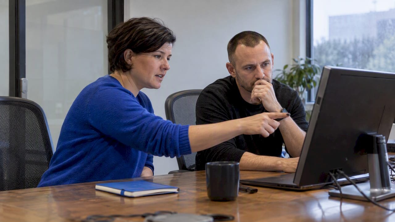 RevOps leaders reviewing a flagged CRM opportunity