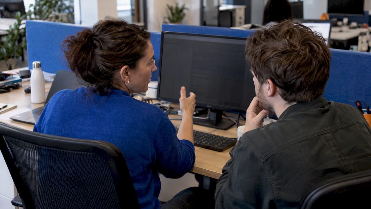 Team reviewing an AI lead enrichment pilot